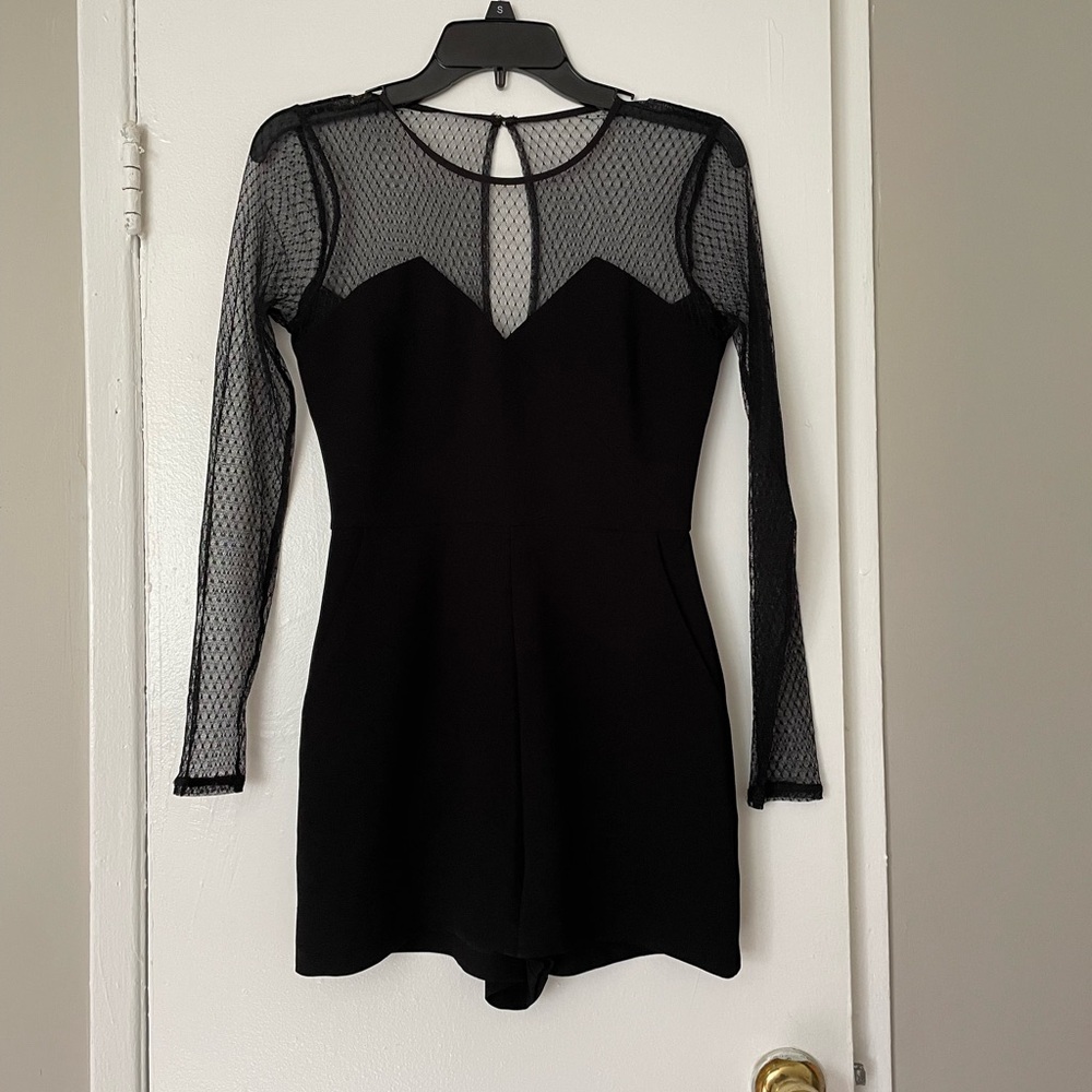 BCBGeneration Black Romper with Mesh Sleeves